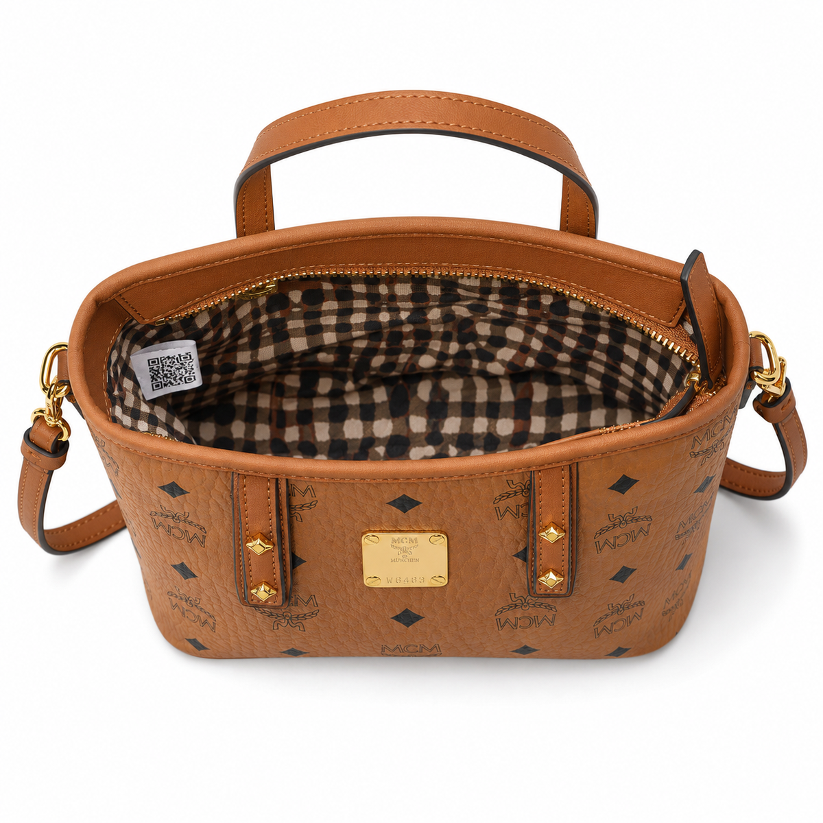 MCM cognac-colored Visetos printed coated canvas adjustable shoulder strap  multi-way commuter tote bag