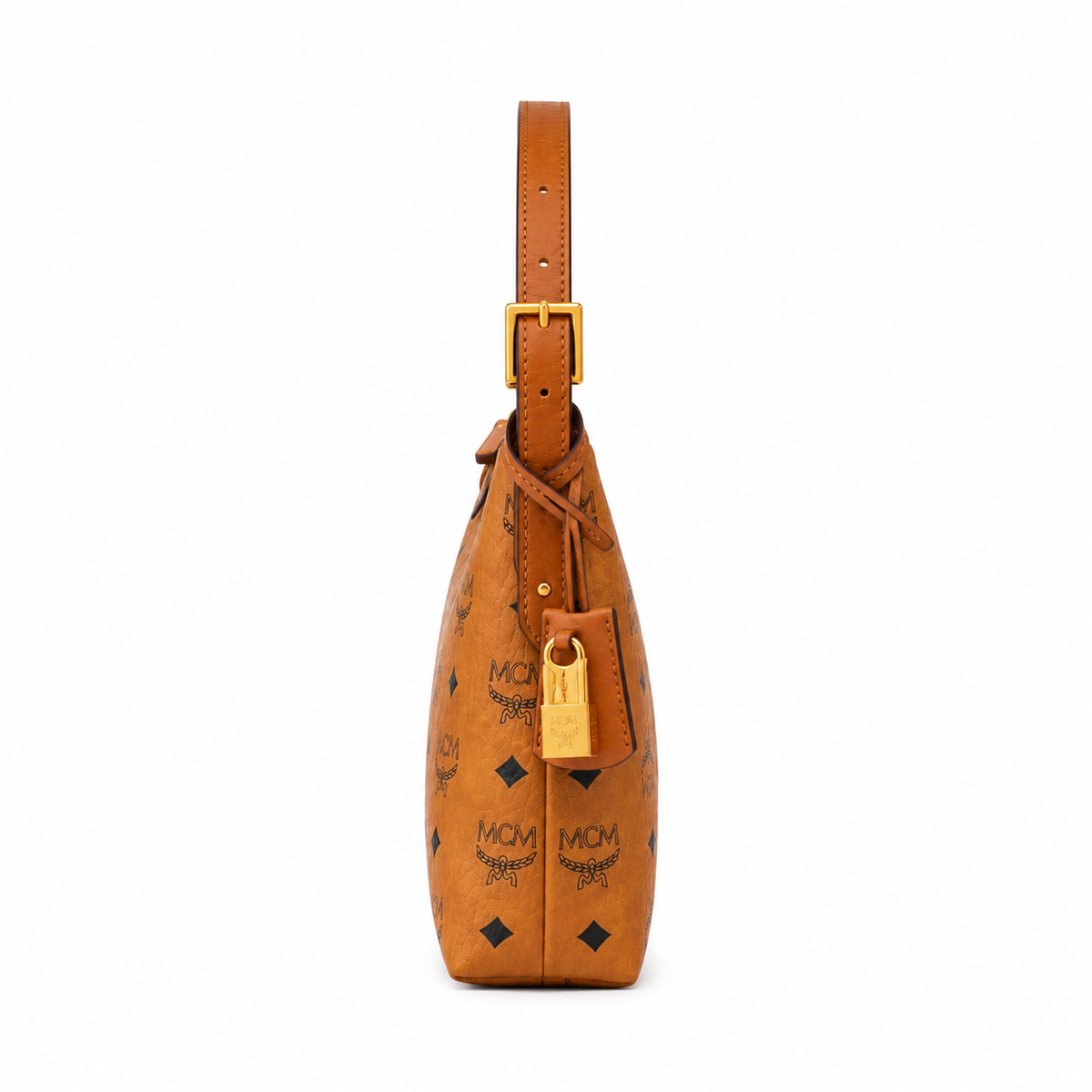 MCM Cognac-colored all-over monogram canvas bag with gold-plated clasp pendant adjustable shoulder strap for single-shoulder or crossbody wear