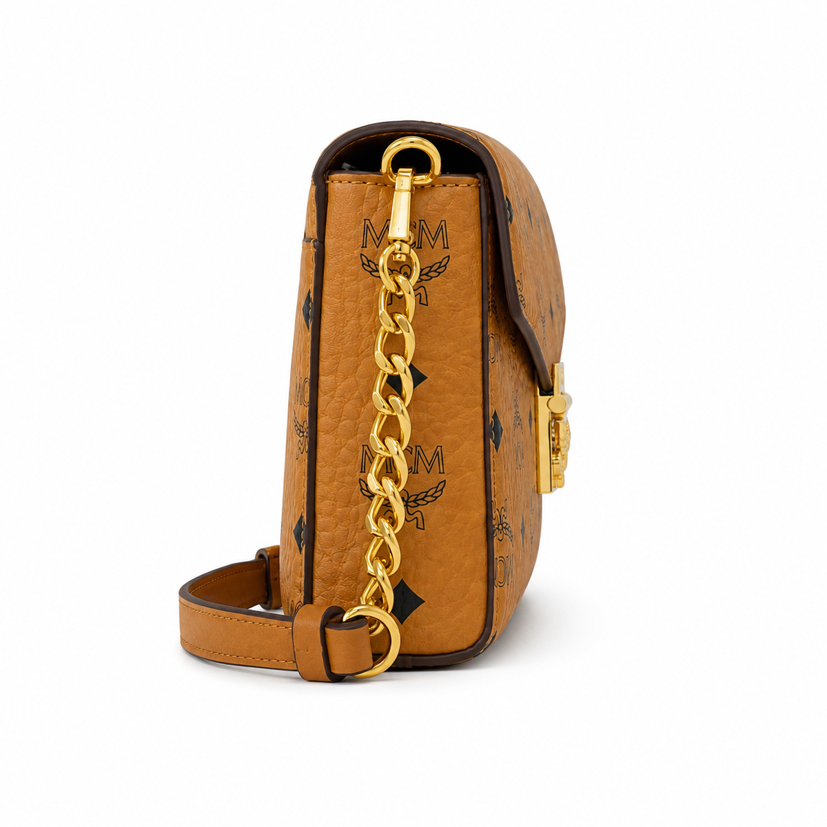 MCM Cognac-colored all-over monogram canvas with a gold laurel leaf clasp detachable shoulder strap for single-shoulder or crossbody wear