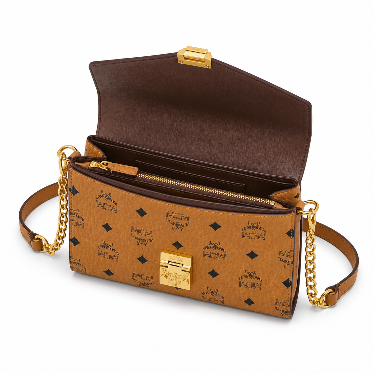 MCM Cognac-colored all-over monogram canvas with a gold laurel leaf clasp detachable shoulder strap for single-shoulder or crossbody wear