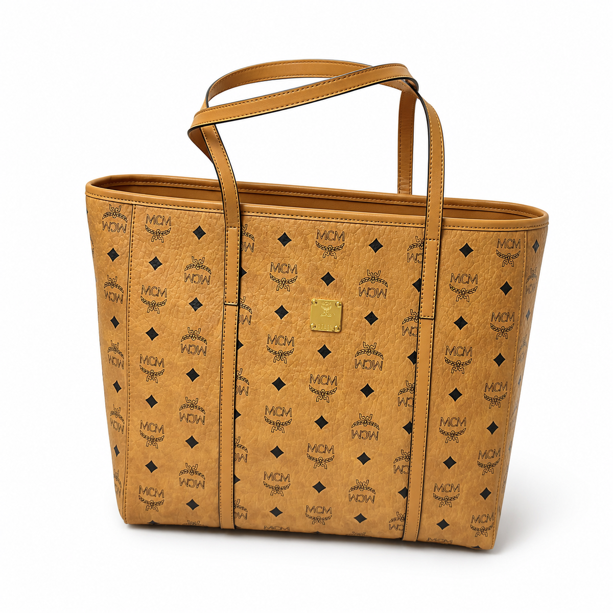 MCM Cognac-colored all-over monogram canvas with gold nameplate adjustable shoulder strap multi-carrying commuter shopping bag