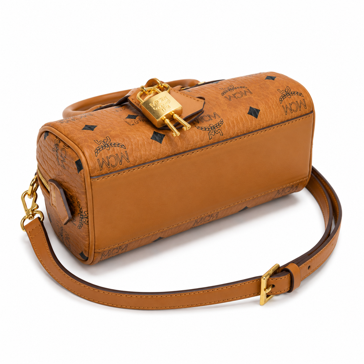 MCM cognac-colored all-over monogram canvas bag with gold-plated clasp pendant adjustable shoulder strap, handbag crossbody bag