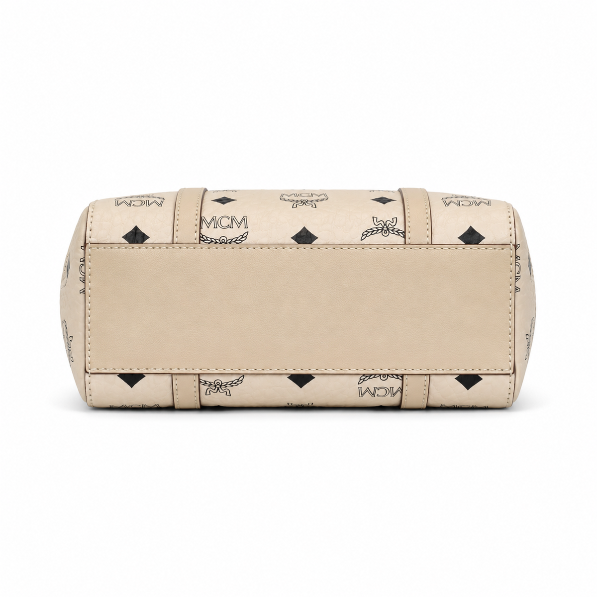 MCM off-white monogram canvas with gold nameplate, detachable shoulder strap, multi-way carrying commuter shopping bag.
