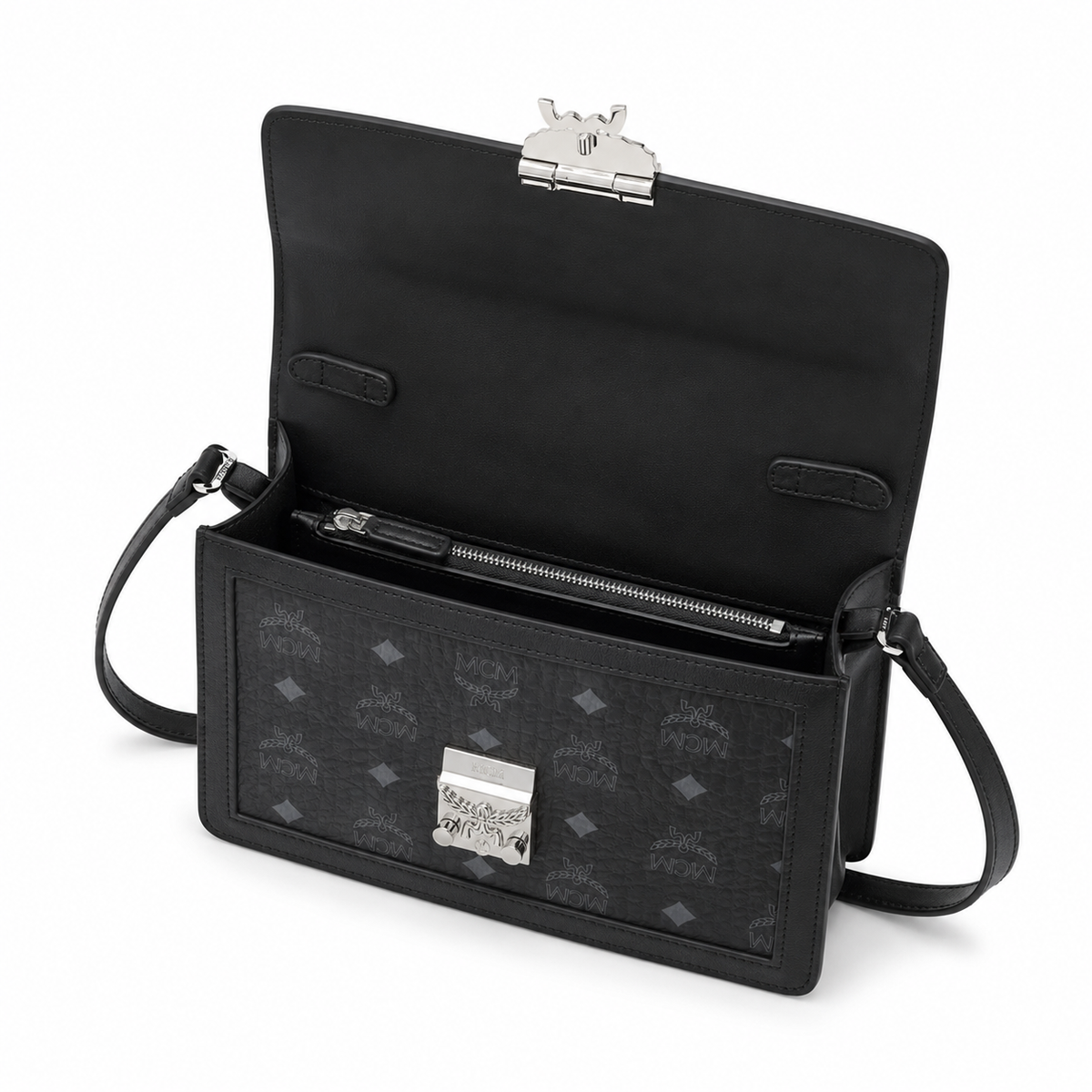 MCM black monogram canvas with silver laurel leaf clasp adjustable shoulder strap for single-shoulder or crossbody wear