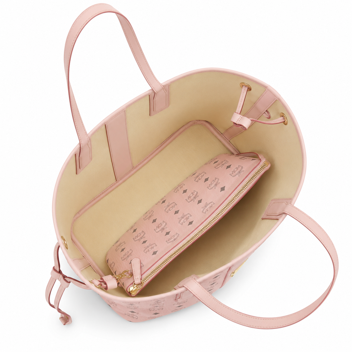 MCM peach pink all-over monogram canvas bag with detachable clutch drawstring adjustable handle versatile for carrying on the shoulder crossbody or as a single shoulder bag