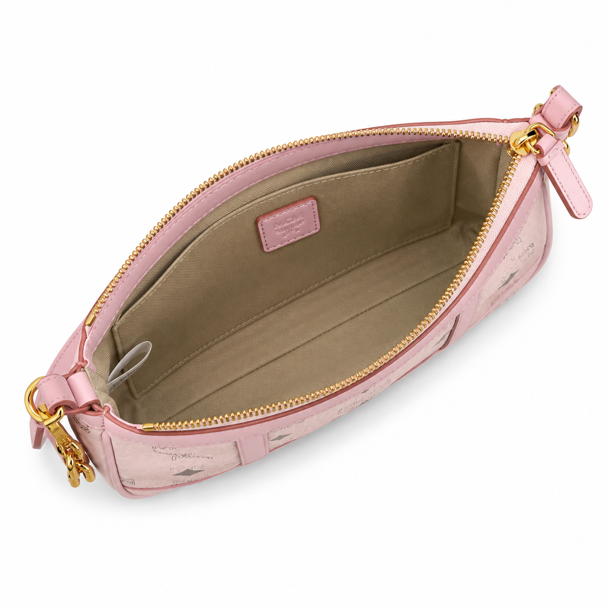 MCM monogram canvas bag with a chunky gold chain adjustable shoulder strap versatile for shoulder crossbody or underarm wear