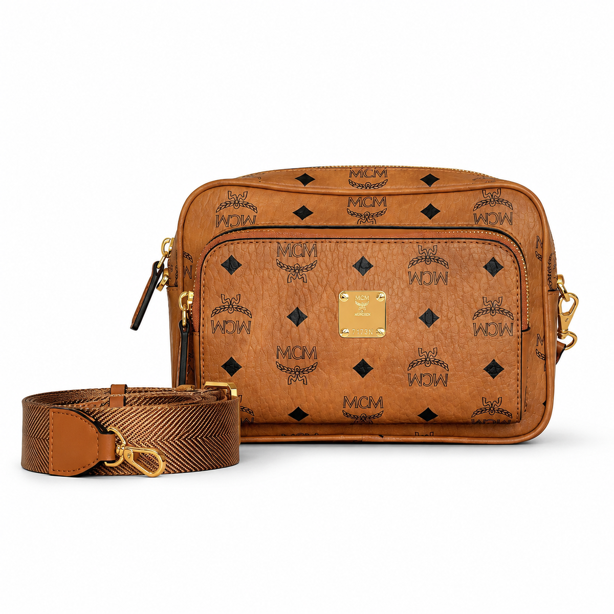MCM all-over monogram canvas camera bag with adjustable shoulder strap in cognac color Versatile design unisex