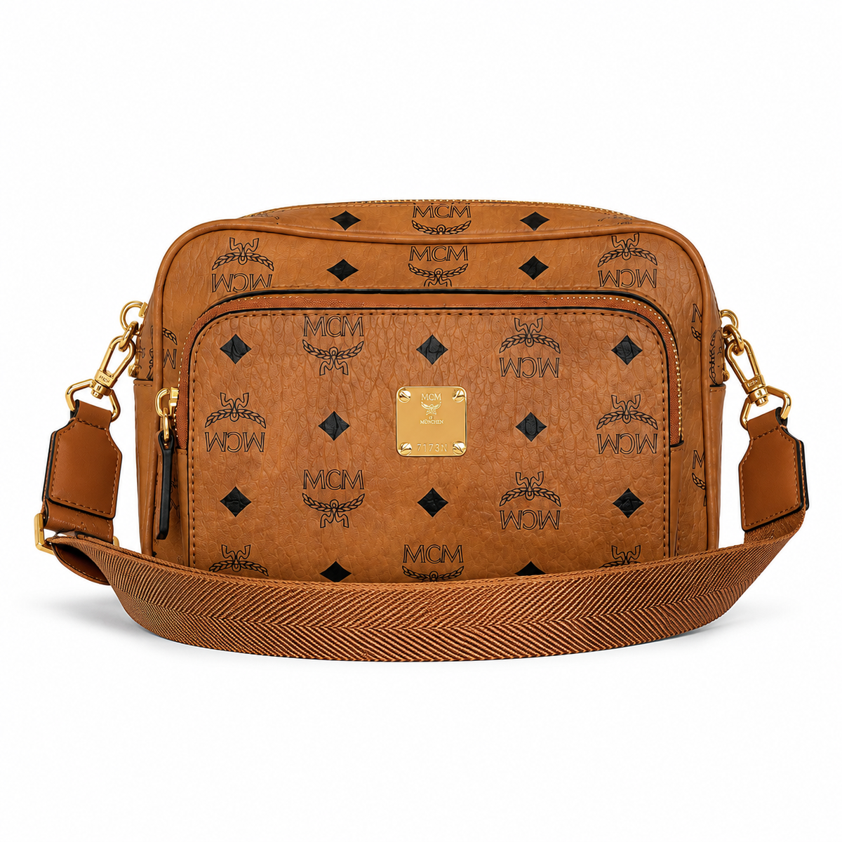 MCM all-over monogram canvas camera bag with adjustable shoulder strap in cognac color Versatile design unisex