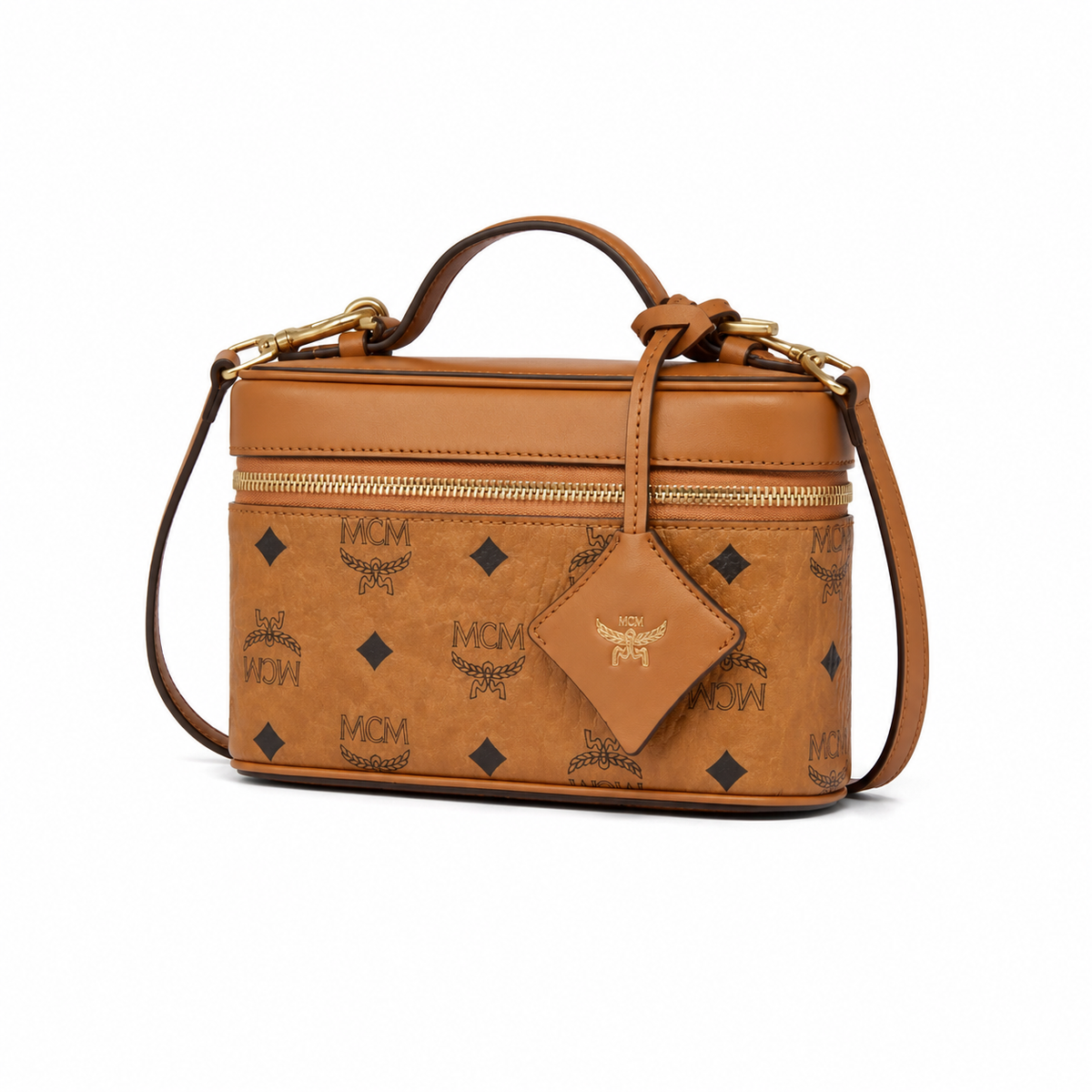 MCM Cognac-colored all-over monogram canvas bag with adjustable shoulder strap can be carried by hand over the shoulder or crossbody