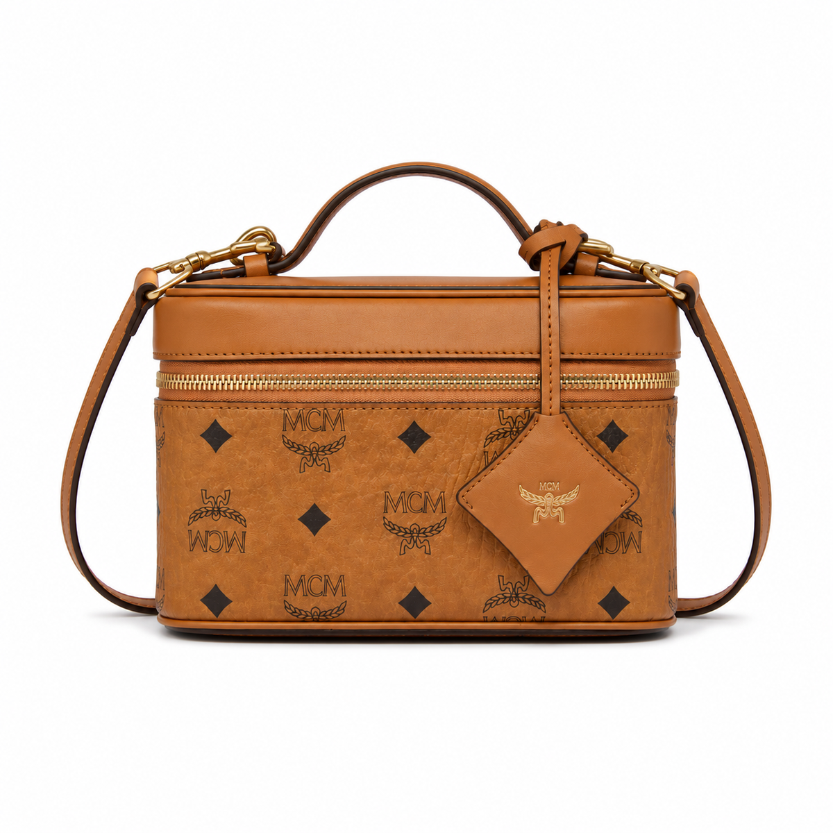MCM Cognac-colored all-over monogram canvas bag with adjustable shoulder strap can be carried by hand over the shoulder or crossbody