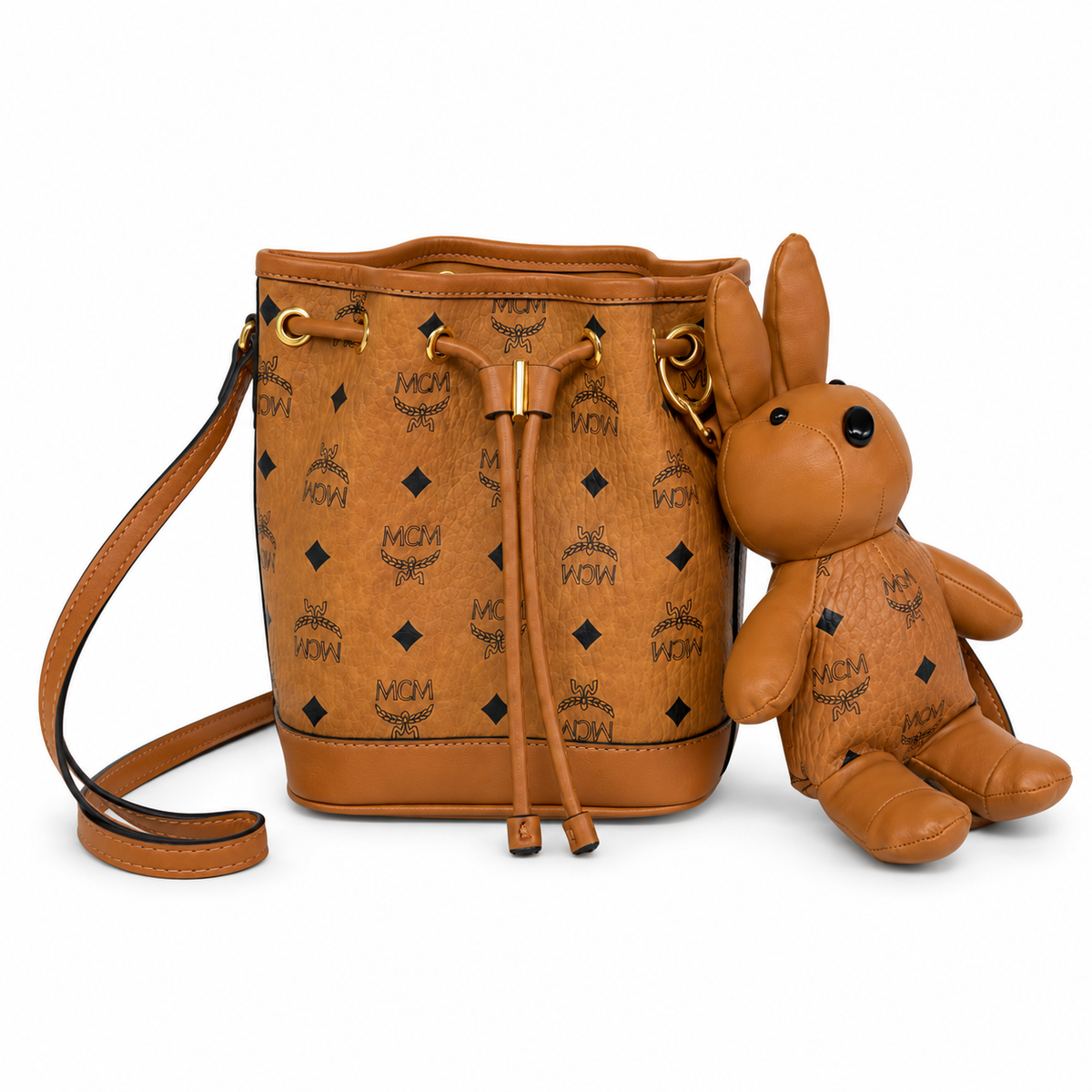 MCM Cognac-colored all-over monogram canvas bag with detachable bunny plush toy drawstring closure mini bucket bag for women