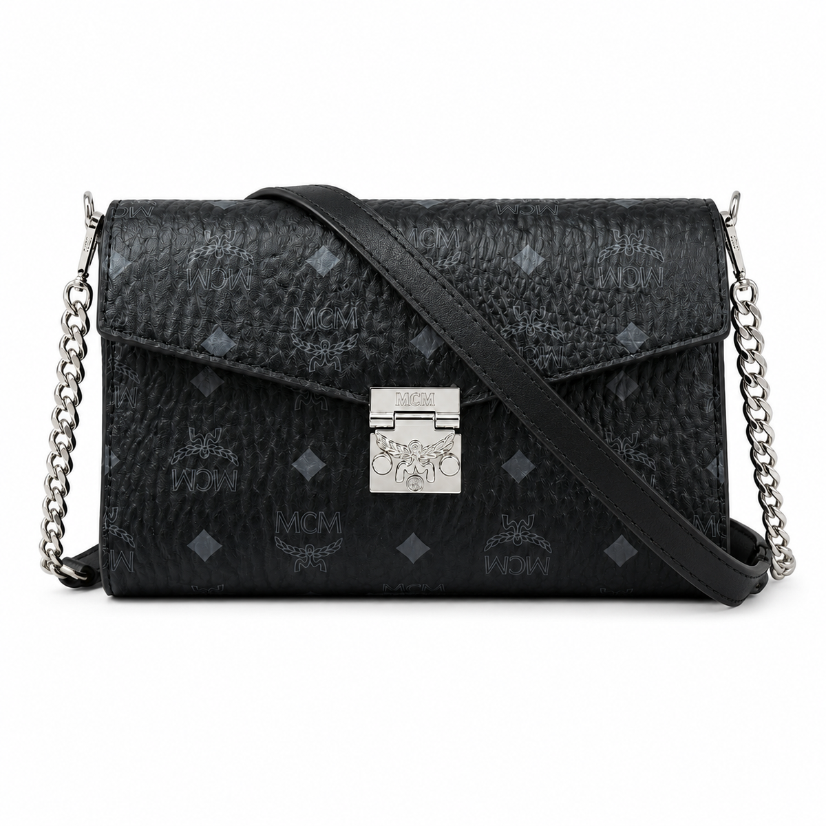 MCM monogram canvas with silver clasp adjustable shoulder strap versatile for single shoulder or crossbody wear