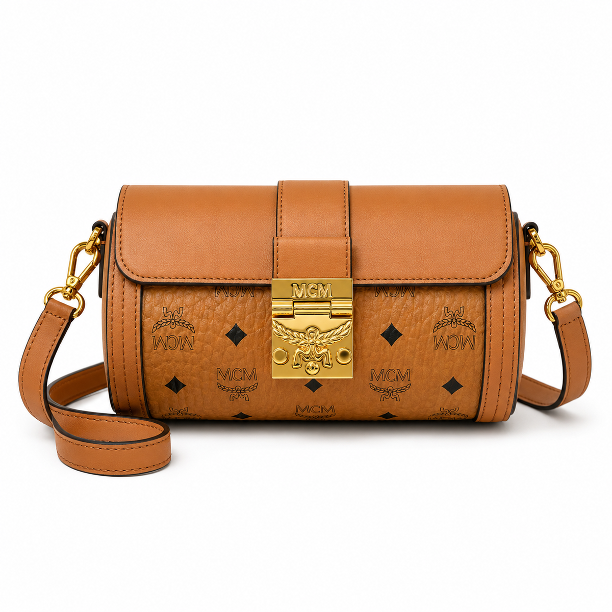 MCM monogram canvas with gold laurel leaf clasp, adjustable shoulder strap, versatile women's bag for single shoulder or crossbody wear.