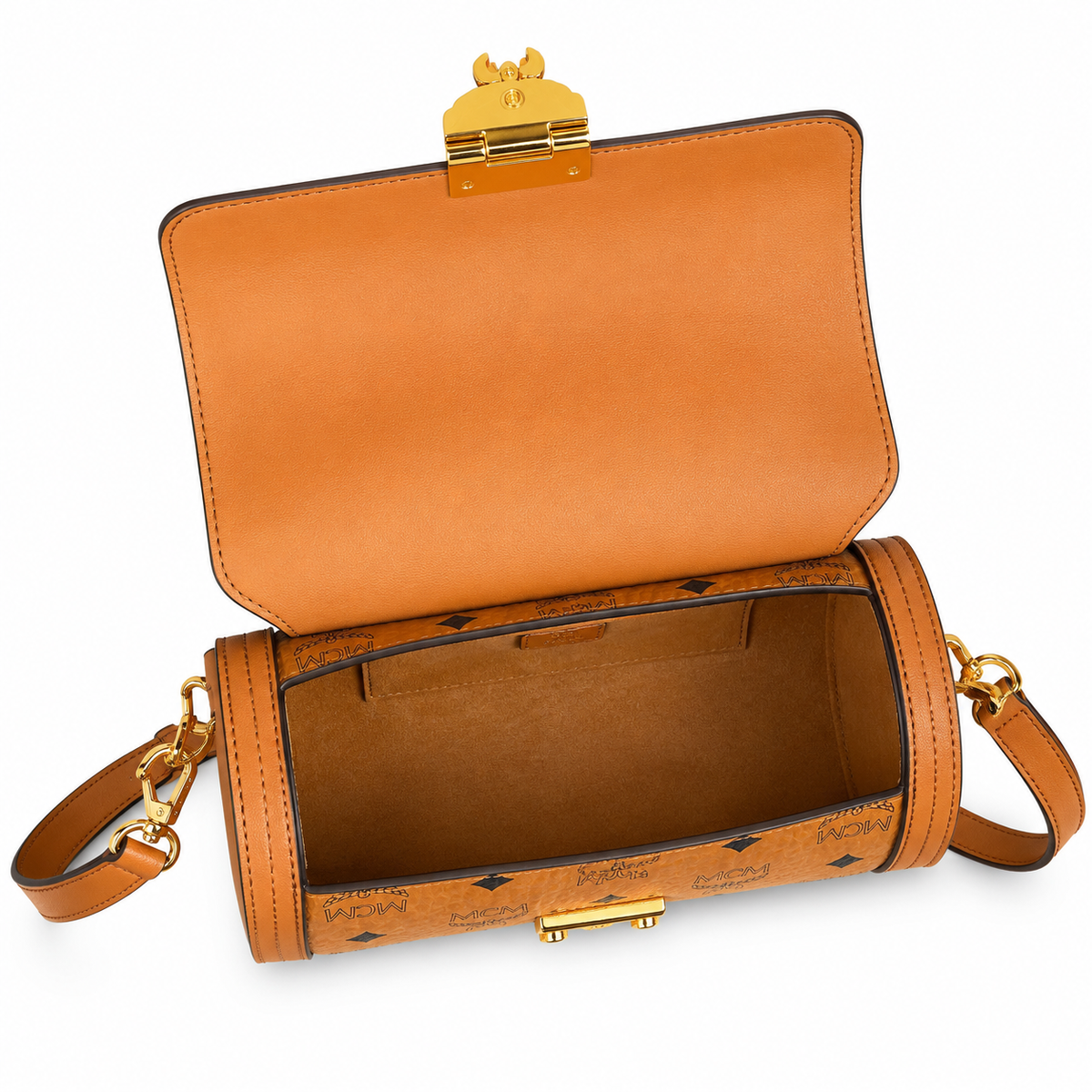 MCM monogram canvas with gold laurel leaf clasp, adjustable shoulder strap, versatile women's bag for single shoulder or crossbody wear.