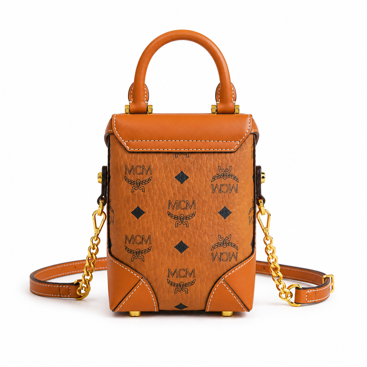 MCM cognac-colored all-over monogram canvas with a gold laurel leaf clasp Adjustable shoulder strap can be carried by hand over the shoulder or crossbody Multi-purpose women's bag