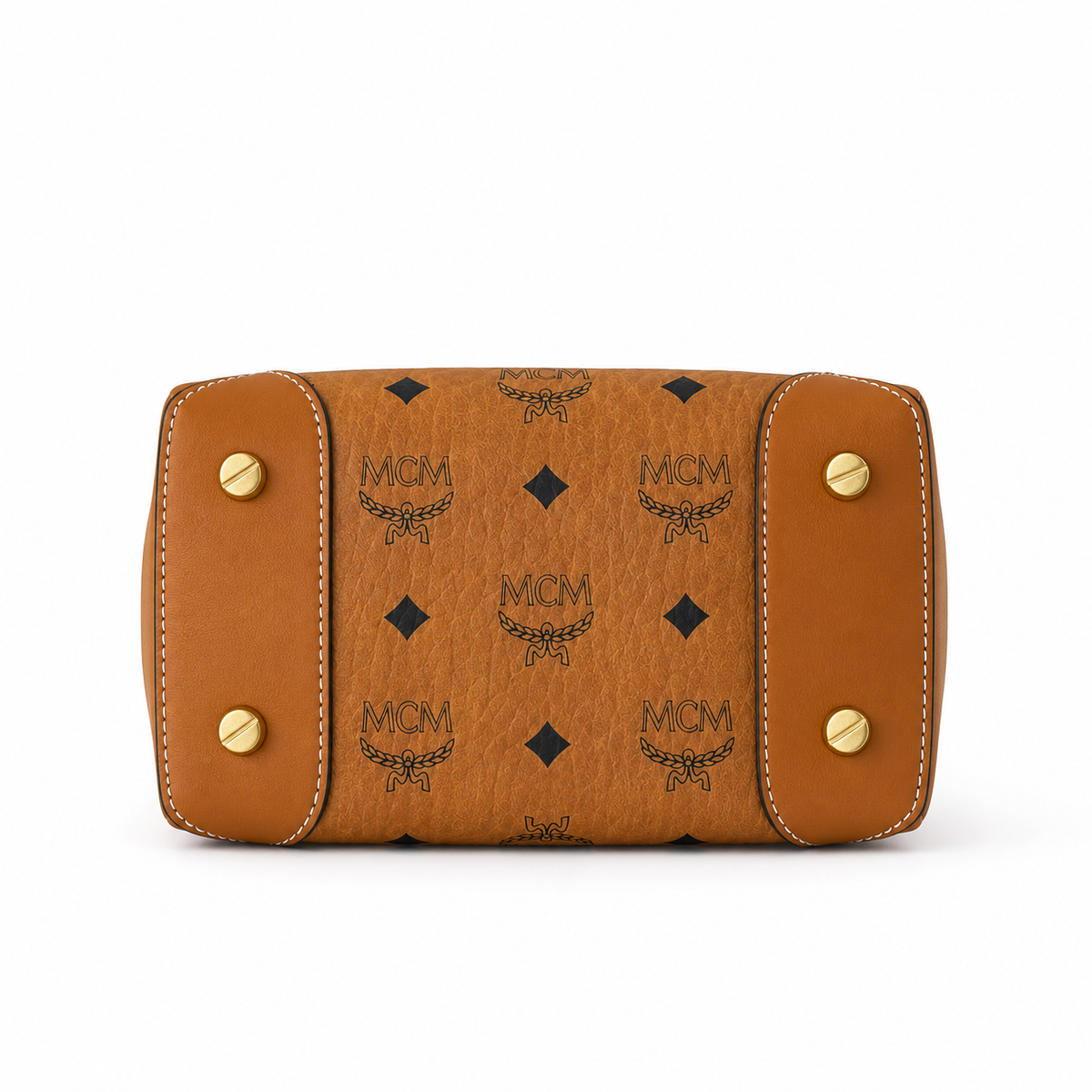 MCM Cognac-colored all-over monogram canvas bag with adjustable shoulder strap can be carried by hand over the shoulder or crossbody