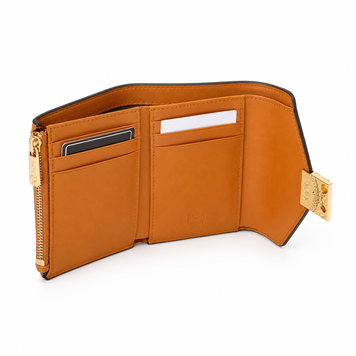 MCM cognac-colored all-over print + gold clasp multi-card slot zippered clutch for women