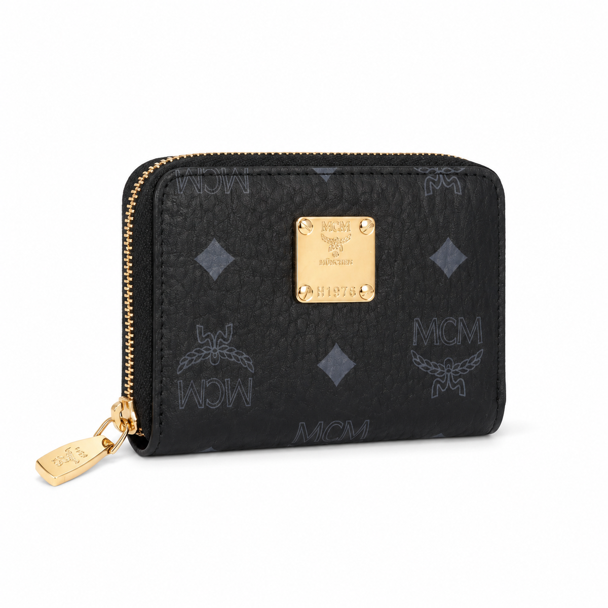 MCM women's clutch bag with all-over print in black and gold clasp featuring multiple card slots and zippered compartments