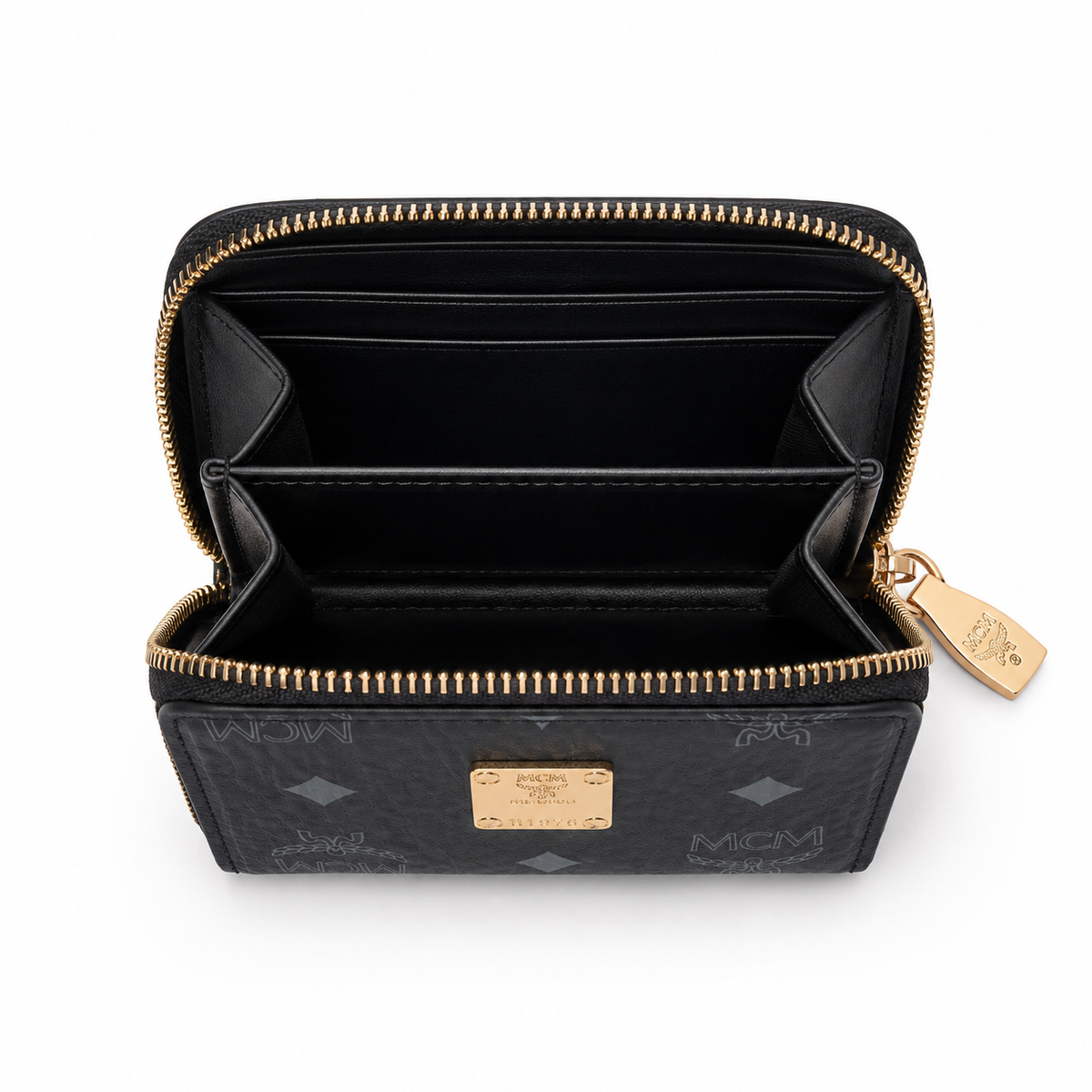 MCM women's clutch bag with all-over print in black and gold clasp featuring multiple card slots and zippered compartments