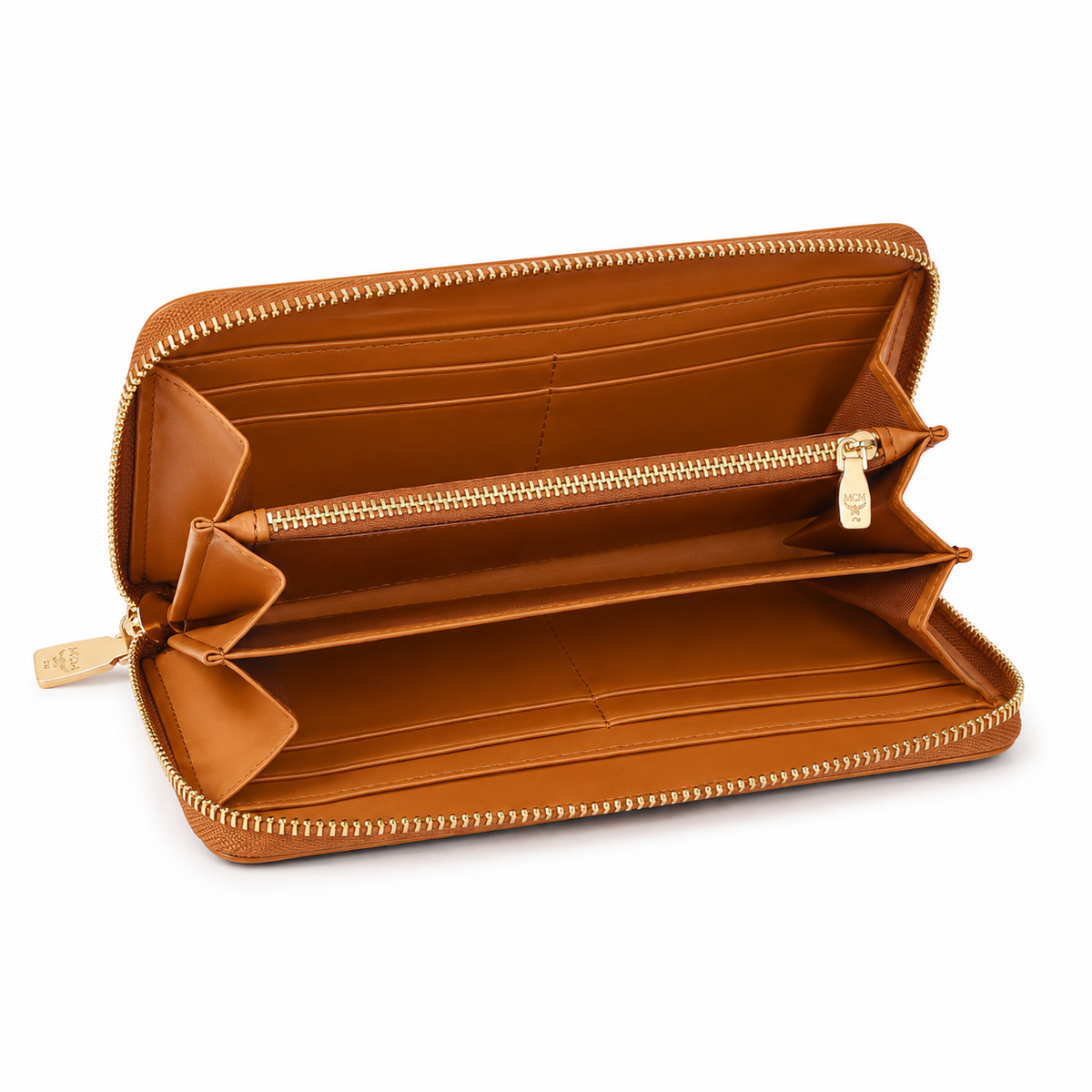 MCM women's clutch bag with all-over print in black and gold clasp featuring multiple card slots and zippered compartments