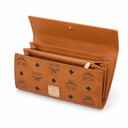 MCM cognac-colored all-over print + gold clasp multi-card slot zippered clutch for women