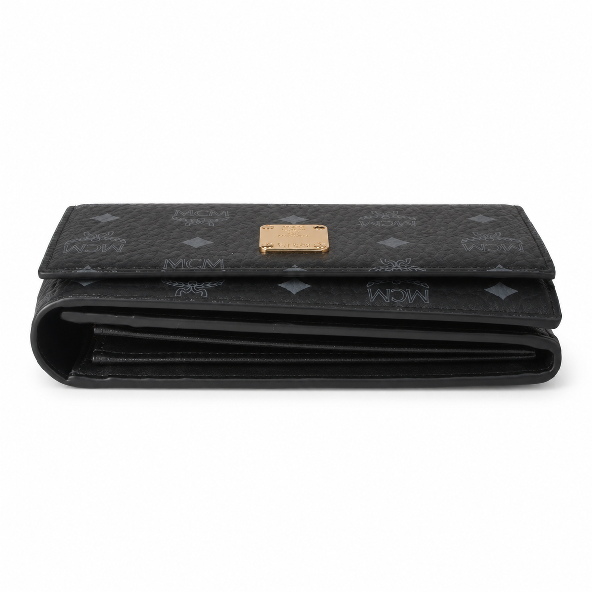 MCM women's clutch bag with all-over print in black and gold clasp featuring multiple card slots and zippered compartments