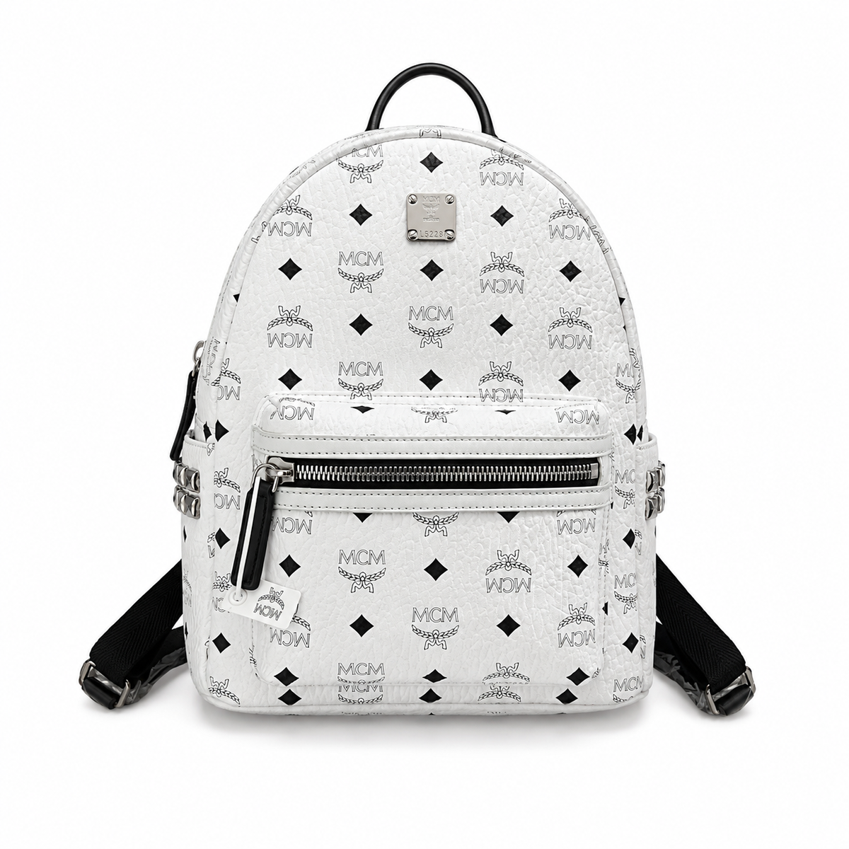 MCM all-over print + side rivets, unisex large-capacity commuter/travel bag.