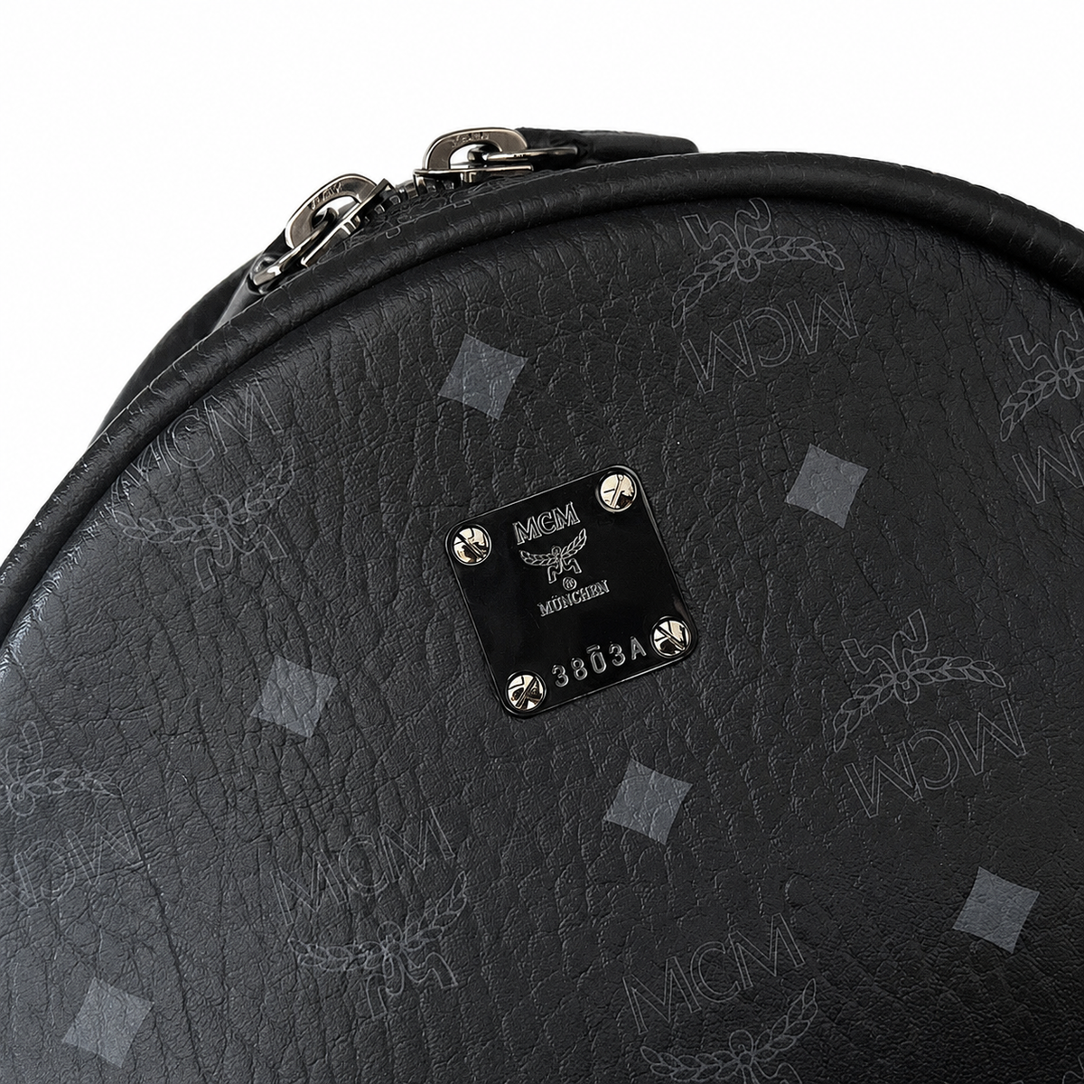 MCM black all-over print with side studs unisex large-capacity commuter/travel bag