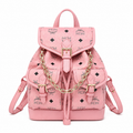MCM Aren series mini drawstring chain bag in cherry blossom pink with flap drawstring a stylish mini backpack/travel bag for women perfect for commuting or outings