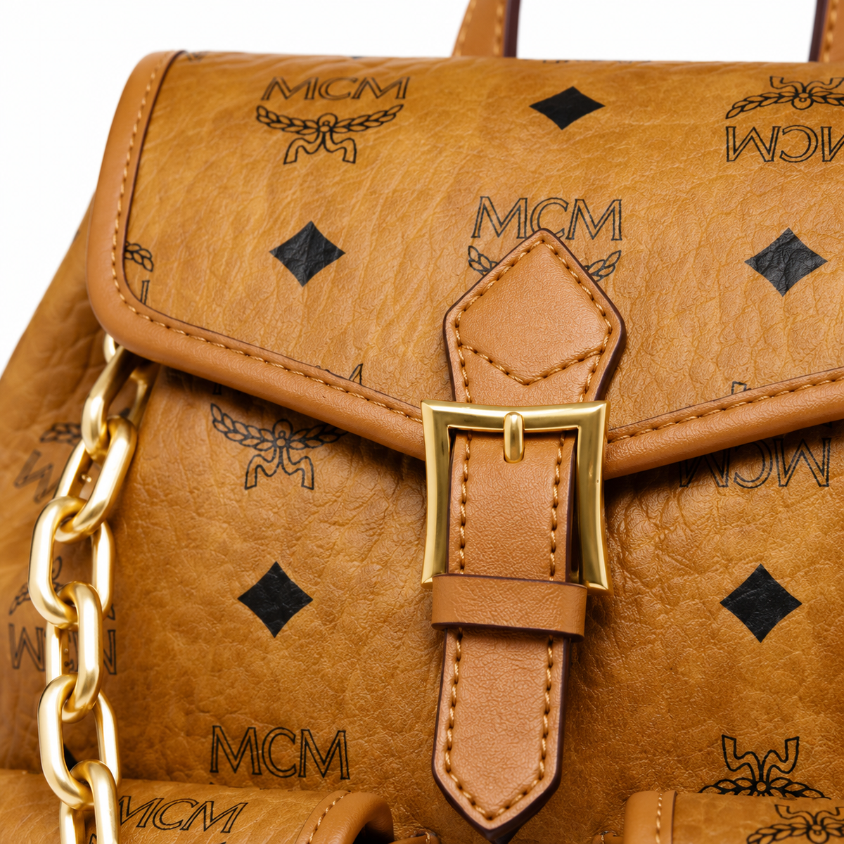 MCM Aren Series Mini Drawstring Chain Bag in Cognac Brown with Flap Drawstring a stylish mini backpack/travel bag for women perfect for commuting or outings