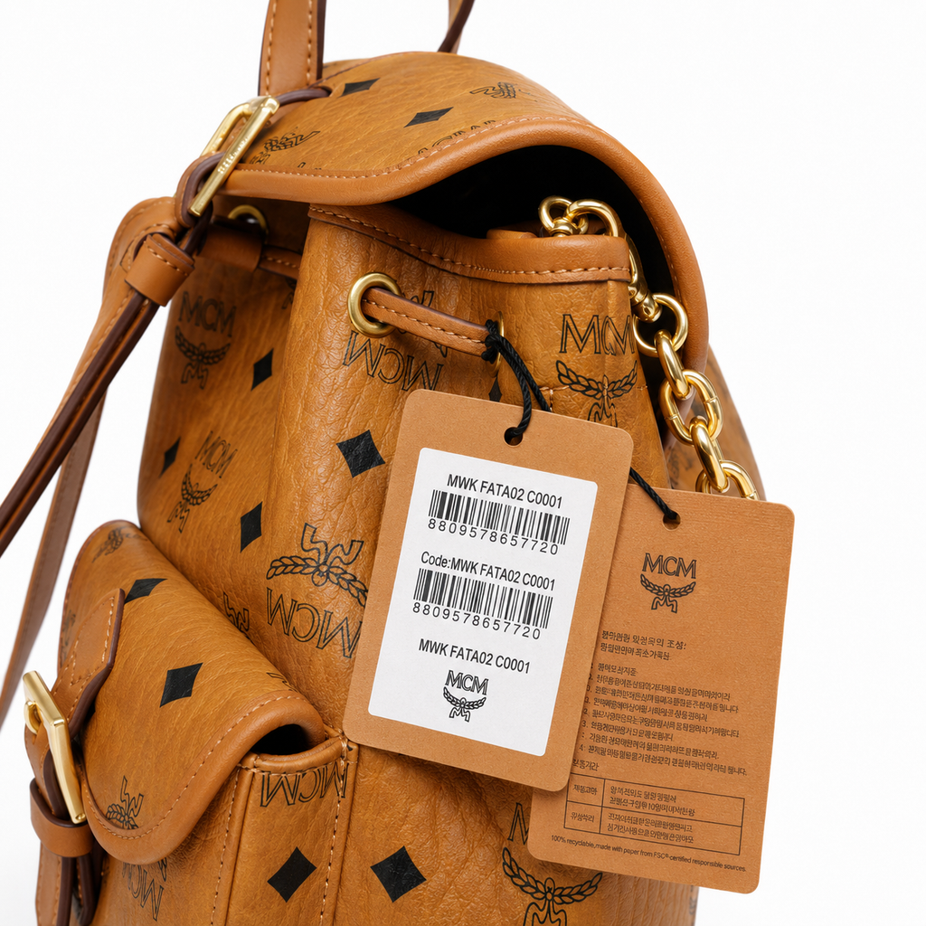 MCM Aren Series Mini Drawstring Chain Bag in Cognac Brown with Flap Drawstring a stylish mini backpack/travel bag for women perfect for commuting or outings