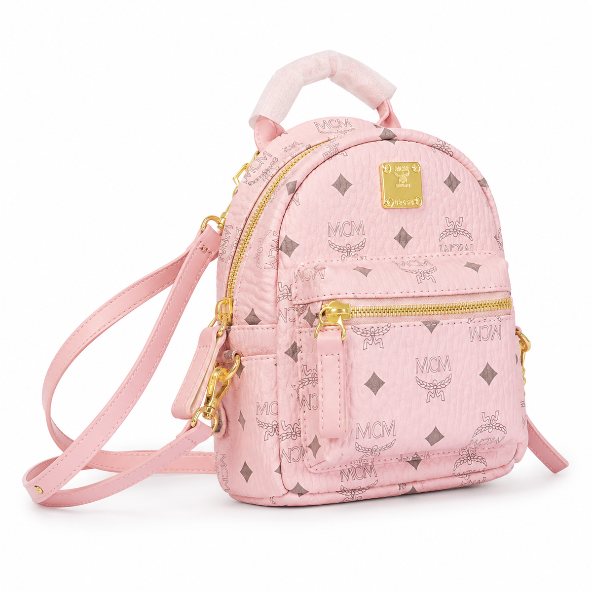 MCM Stark series ultra-mini Visetos print soft pink bag with side studs and a detachable shoulder strap a stylish mini backpack/crossbody bag for women perfect for commuting or outings