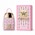 MCM Crush Eau de Parfum 75ml | Pink Stark backpack design with Visetos print a floral fruity  and woody fragrance for women suitable for gifting or personal enjoyment