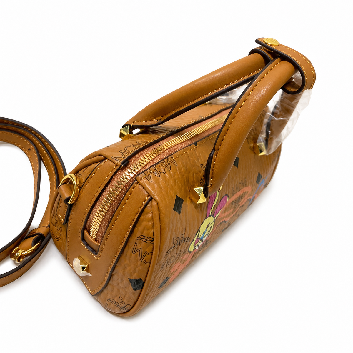 MCM x SAMBYPEN Mini Boston Bag Graffiti Rabbit + Visetos Print + Detachable Shoulder Strap, can be carried by hand or worn crossbody a trendy collectible