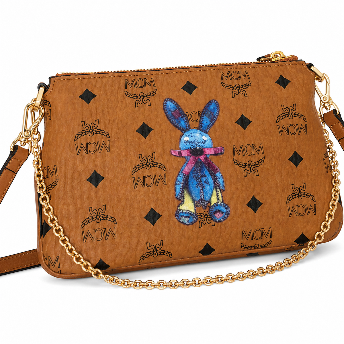 MCM's classic Visetos print rabbit blue embroidered rabbit with gold chain and detachable shoulder strap can be carried by hand or worn crossbody a trendy collectible