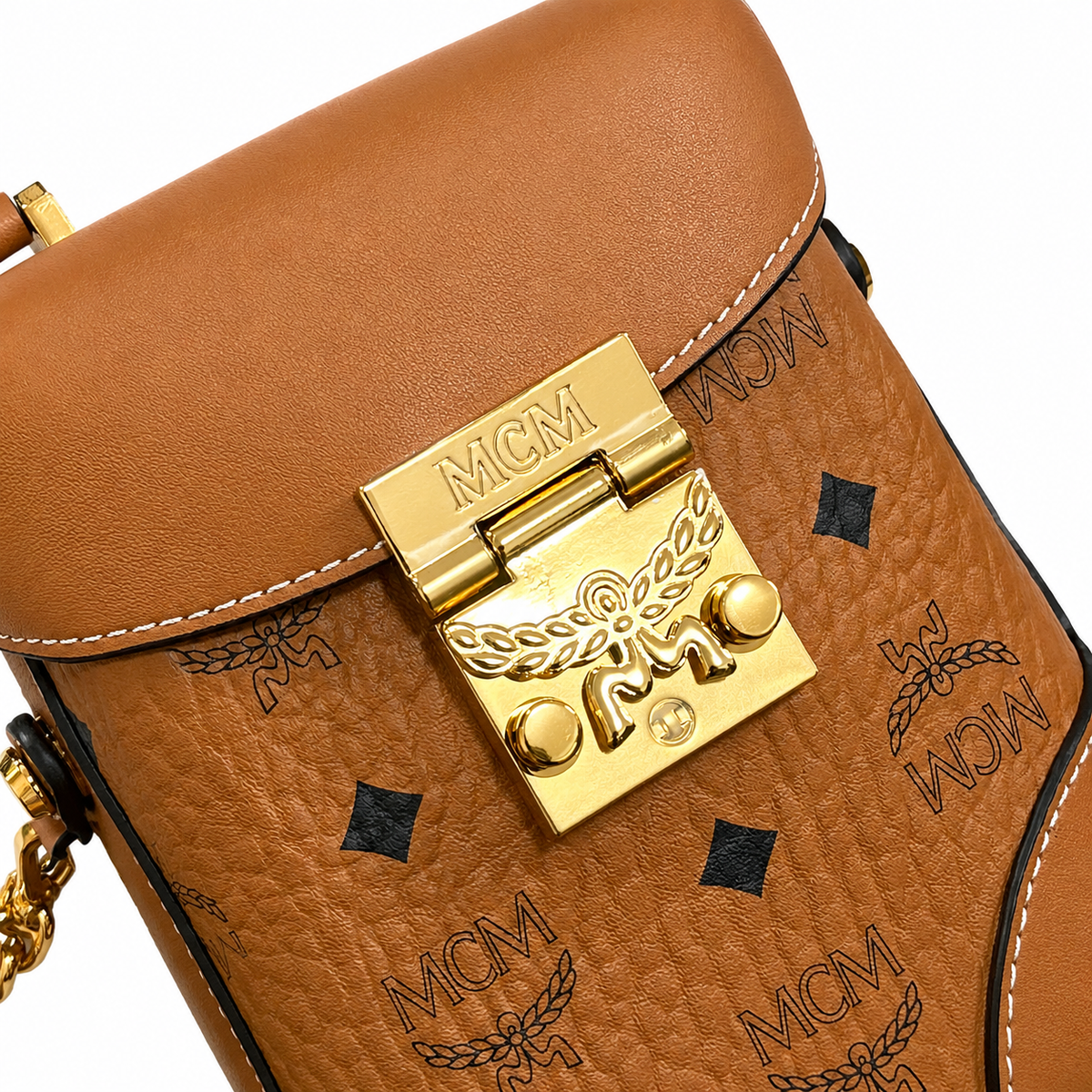 MCM Soft Berlin Mini Fries Bag | Cognac-colored Visetos print + detachable shoulder strap can be carried by hand or worn crossbody Spring/Summer 2026 new arrival